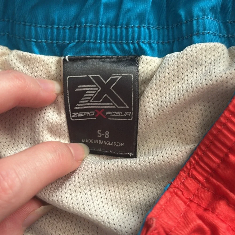 ZeroXposur Boys Red and Blue Shark Wave Swim Trunks